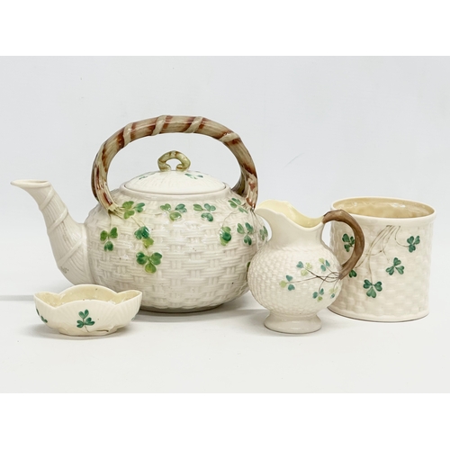 49 - 4 pieces of 2nd Period Belleek Pottery. Late 19th/early 20th century. Circa 1891-1926. Teapot 22x18c... 