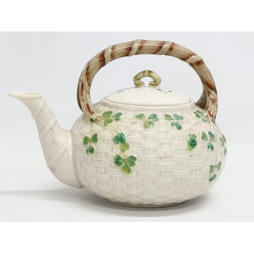 49 - 4 pieces of 2nd Period Belleek Pottery. Late 19th/early 20th century. Circa 1891-1926. Teapot 22x18c... 