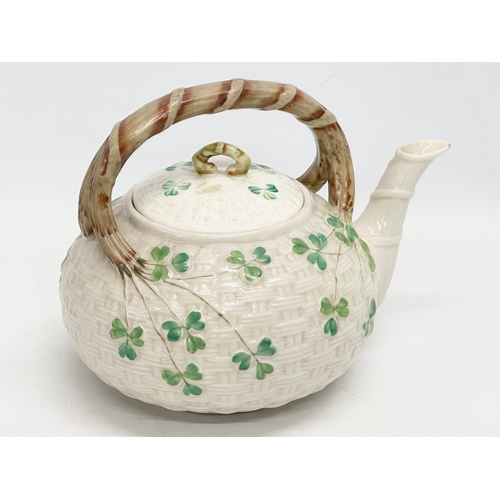 49 - 4 pieces of 2nd Period Belleek Pottery. Late 19th/early 20th century. Circa 1891-1926. Teapot 22x18c... 