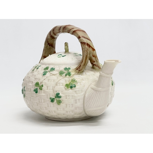 49 - 4 pieces of 2nd Period Belleek Pottery. Late 19th/early 20th century. Circa 1891-1926. Teapot 22x18c... 