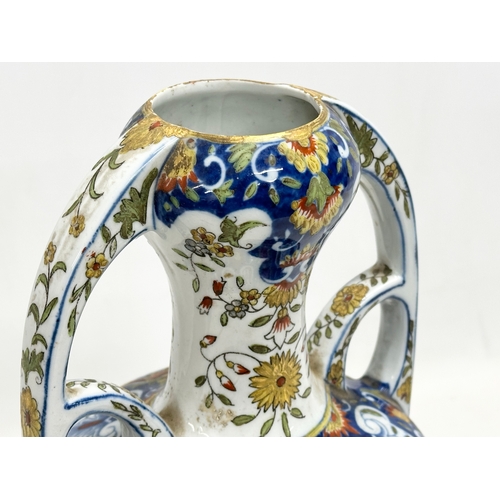 55 - A late 19th century North European hand painted ceramic pot with 2 handles. 16x32cm