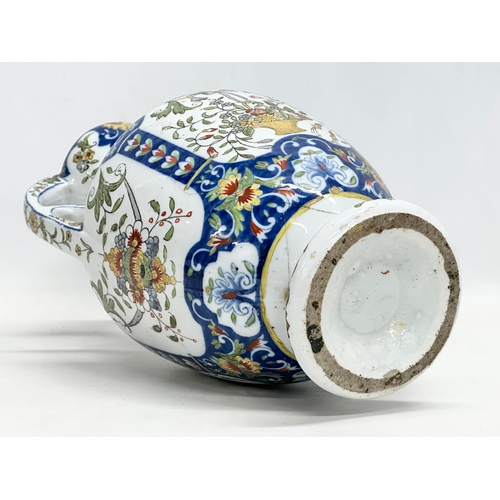 55 - A late 19th century North European hand painted ceramic pot with 2 handles. 16x32cm