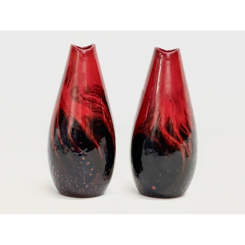 74 - A pair of Royal Doulton ‘Flambe Veined’ vases. Number 1613. 17cm.