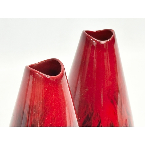 74 - A pair of Royal Doulton ‘Flambe Veined’ vases. Number 1613. 17cm.