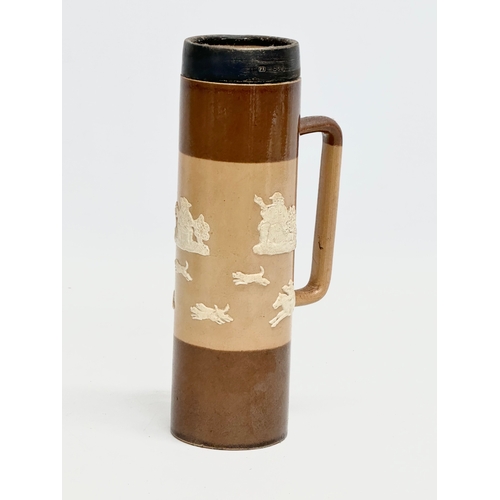 83 - A tall late 19th century silver rimmed Doulton Lambeth stoneware tankard 19cm, with an early 20th ce... 