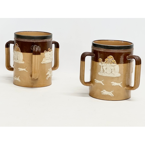 84 - A pair of large early 20th century Royal Doulton Lambeth stoneware Tyg tankard mugs. Silver (plated)... 