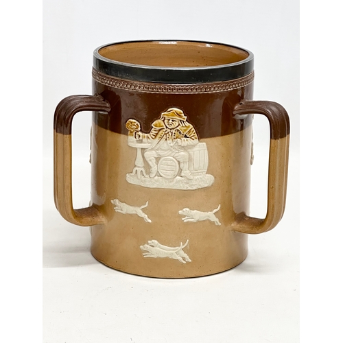 84 - A pair of large early 20th century Royal Doulton Lambeth stoneware Tyg tankard mugs. Silver (plated)... 