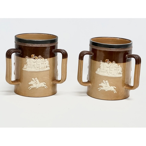 84 - A pair of large early 20th century Royal Doulton Lambeth stoneware Tyg tankard mugs. Silver (plated)... 