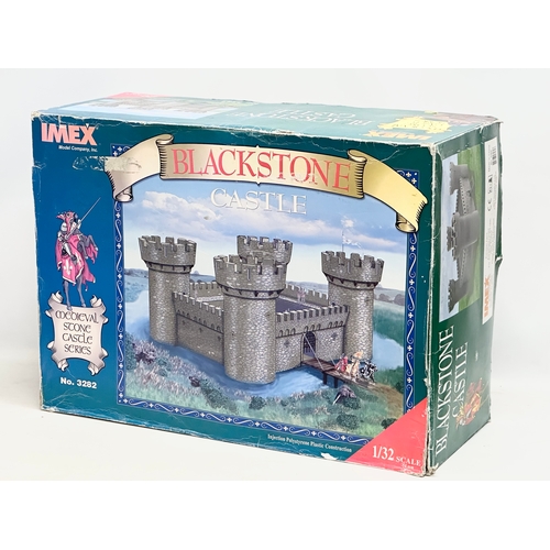 653 - A large unused Imex Model Company INC Medieval Stone Castle Series ‘Blackstone Castle’  with box and... 