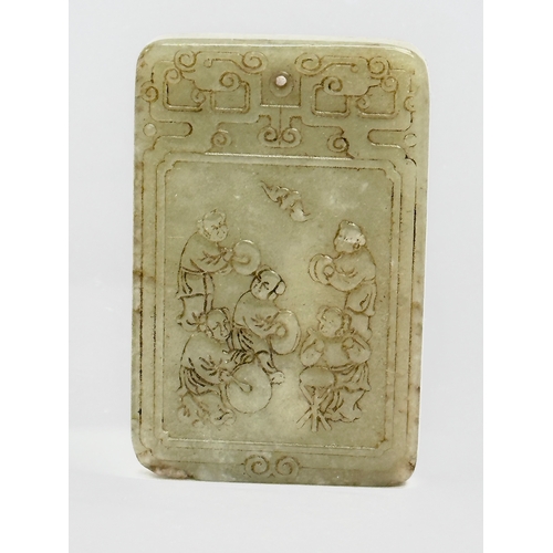 85 - Chinese Jade. A vintage Chinese celadon square pendant 6.5cm. With a later Chinese Jade pendant and ... 