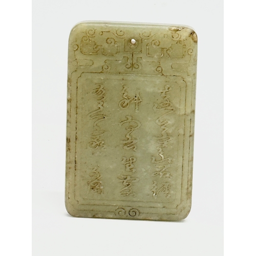 85 - Chinese Jade. A vintage Chinese celadon square pendant 6.5cm. With a later Chinese Jade pendant and ... 