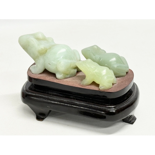 86 - Chinese Jade and marble. 3 Chinese Jade frogs on stand 13cm. A Chinese Jade pendant. 3 marble orname... 