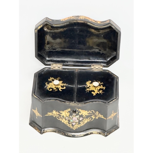 17 - A mid 19th century Jennens & Bettridge gilt and Mother of Pearl inlaid lacquered tea caddy with orig... 