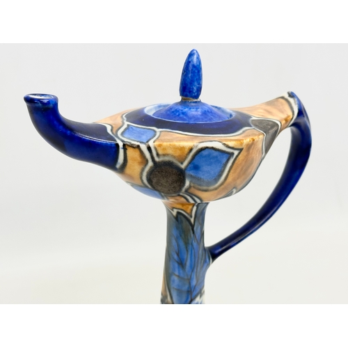 103 - A 1930’s ‘Chameleon Ware’ Aladdins Lamp designed by George Clews for Clews & Co LTD. 15.5x21cm