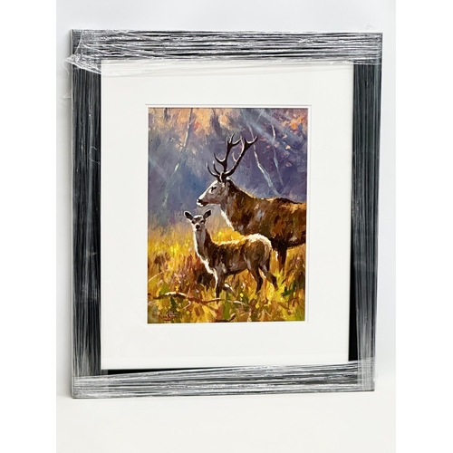 105 - An oil painting on board by Donal McNaughton. Stags in the Field. In new frame. 29x39cm. Frame 56.5x... 