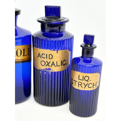 112 - 5 Victorian Bristol Blue chemist bottles. 24cm