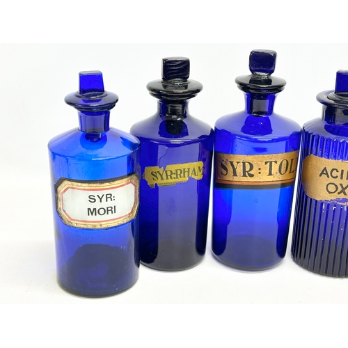 112 - 5 Victorian Bristol Blue chemist bottles. 24cm