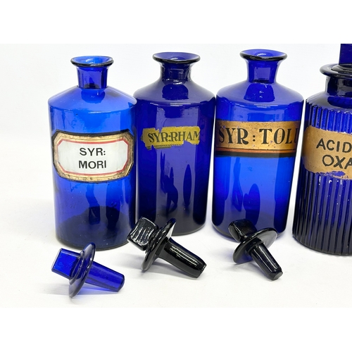 112 - 5 Victorian Bristol Blue chemist bottles. 24cm