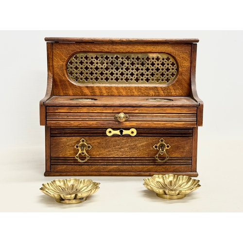 38 - A late 19th century Neo Gothic oak desktop piano form caddy. Circa 1880. 28x20x24.5cm