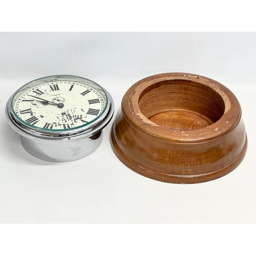 196 - A large Ships bulkhead clock. 33x14cm