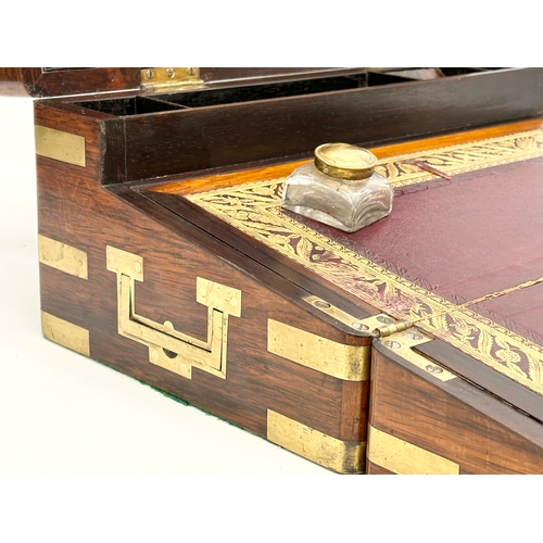 28 - An excellent quality Victorian brass bound rosewood writing slope with leather interior. Open 40.5x4... 