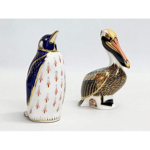 202 - Royal Crown Derby. A Royal Crown Derby Brown Pelican 13cm. A Royal Crown Derby penguin 14cm