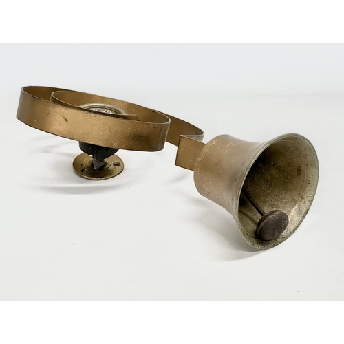 172 - A Victorian brass shops bell/servants bell. 28cm