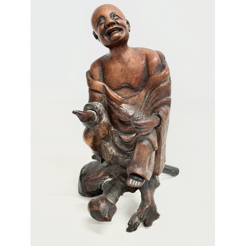 151 - 2 19th century Chinese carved boxwood and rosewood figures. 31cm