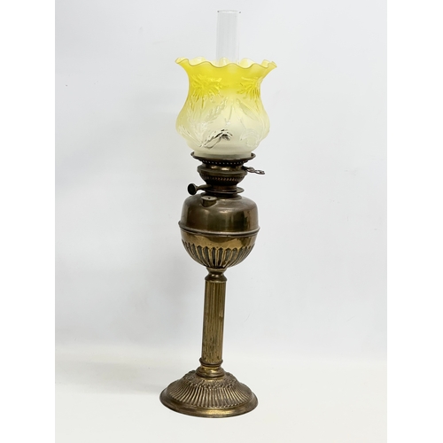 113 - A tall Victorian brass oil lamp. 71cm