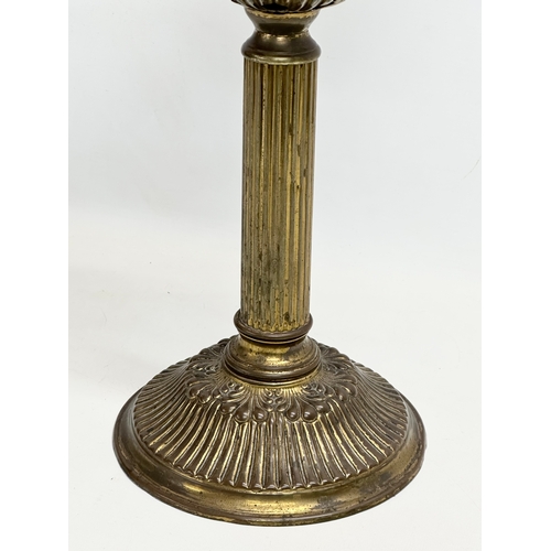 113 - A tall Victorian brass oil lamp. 71cm