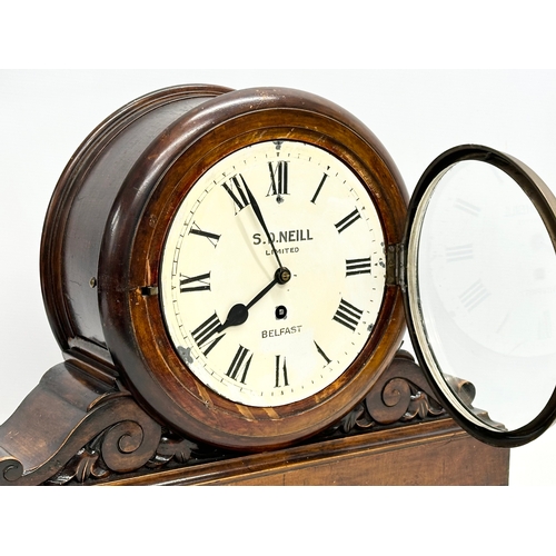 114 - A late 19th century mahogany boardroom clock. A.D. Neill Limited, Belfast. With pendulum. 47x15x35.5... 