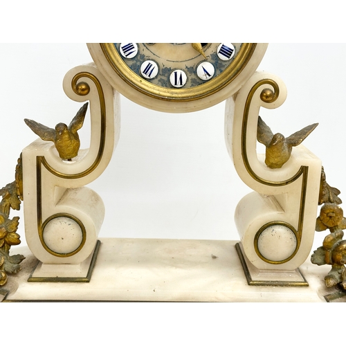 129 - A large late 19th century French onyx and gilt brass mantle clock on stand. 40x12x49cm