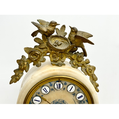 129 - A large late 19th century French onyx and gilt brass mantle clock on stand. 40x12x49cm