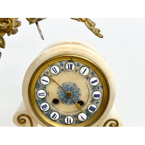 129 - A large late 19th century French onyx and gilt brass mantle clock on stand. 40x12x49cm