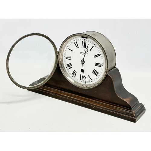 206 - An early 20th century mahogany and heavy plated mantle clock. S.D. Neill LTD, Belfast. 31.5x7x18cm