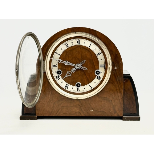 207 - A vintage Art Deco mantle clock by Enfield. With pendulum. 29x12x22cm