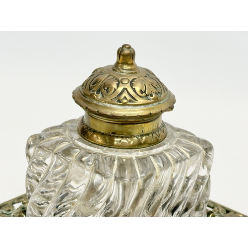 156 - A large Victorian ornate pierced brass inkwell. 17x17x12cm