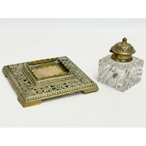 156 - A large Victorian ornate pierced brass inkwell. 17x17x12cm