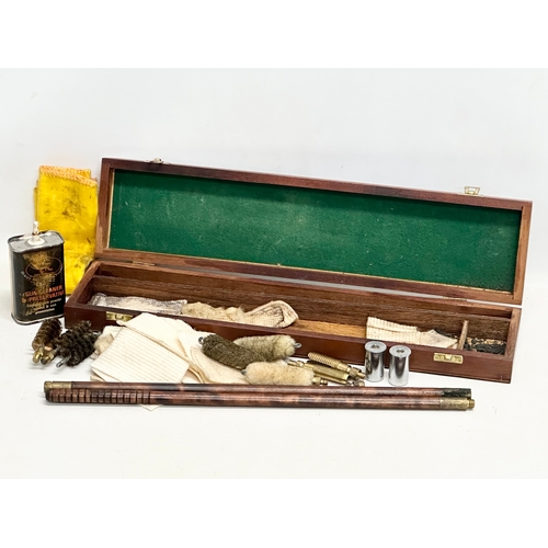 161 - A vintage gun cleaning kit.