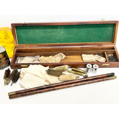 161 - A vintage gun cleaning kit.