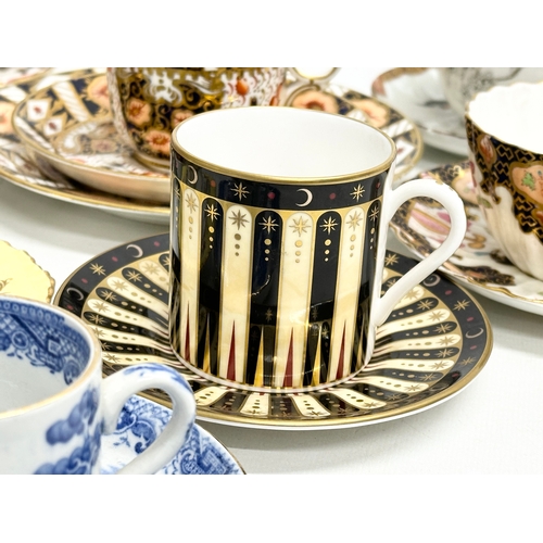 231 - A collection of cups and saucers. Royal Worcester ‘Celebration’ 2001 Collection 250th Anniversary. 2... 