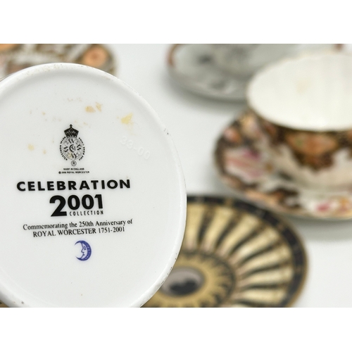 231 - A collection of cups and saucers. Royal Worcester ‘Celebration’ 2001 Collection 250th Anniversary. 2... 