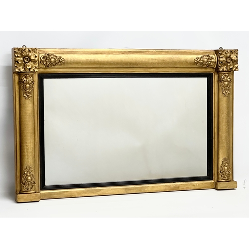 42 - A late 19th century William IV style gilt framed over-mantle mirror. Carver & Gilder. Circa 1880. 10... 