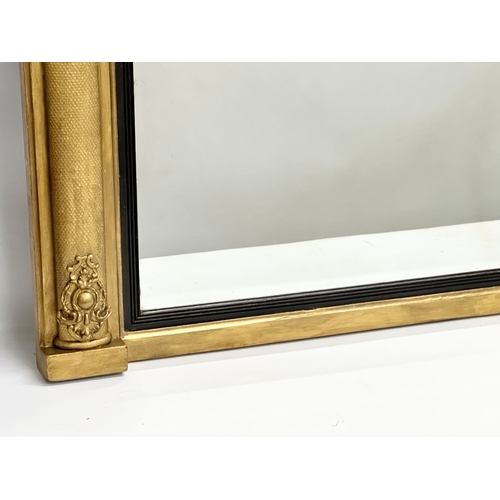 42 - A late 19th century William IV style gilt framed over-mantle mirror. Carver & Gilder. Circa 1880. 10... 