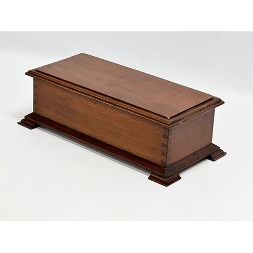 164 - A late Victorian mahogany tabletop storage box. 34x17x11cm