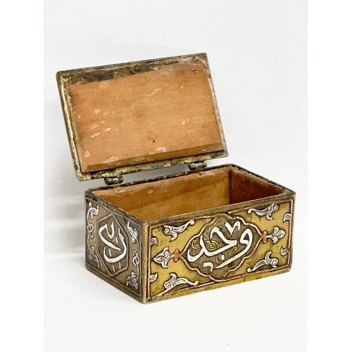 43 - A 19th century Cairo Ware silver and copper inlaid brass trinket box. 9.5x6x4.5cm