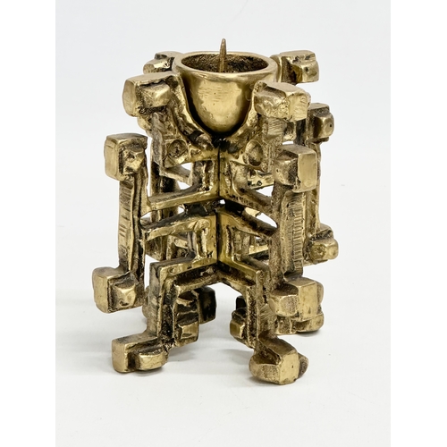 210 - A vintage brass brutalist candleholder. 9x13cm