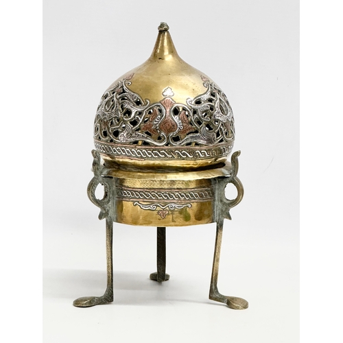 44 - A 19th century Cairo Ware silver and copper inlaid brass incense burner. With a pair of vintage Indi... 