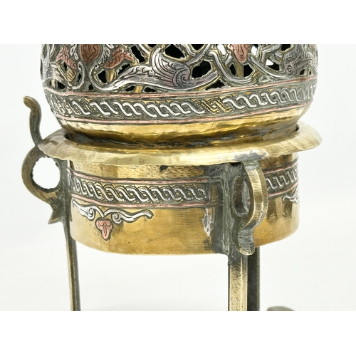 44 - A 19th century Cairo Ware silver and copper inlaid brass incense burner. With a pair of vintage Indi... 