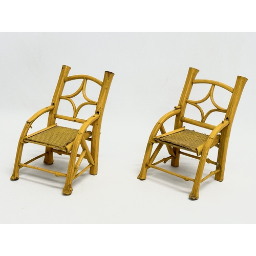 213 - A pair of vintage Chinese style dolls chairs 9x10x13cm. A pair of carnival flatbed horse carts 13cm